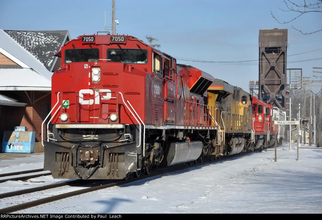 Manifest rolls east past the station